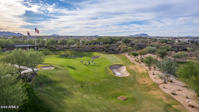 birds eye view of property featuring a mountain view