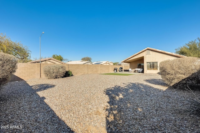 view of yard with a patio area