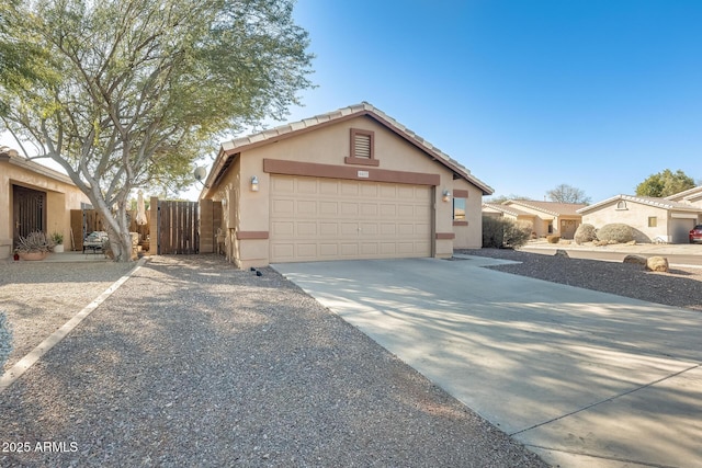 ranch-style house featuring a garage