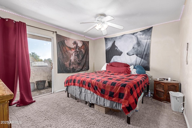 bedroom with access to outside, ceiling fan, and carpet flooring