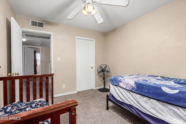 bedroom with light colored carpet and ceiling fan