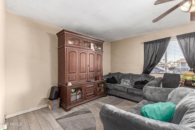 living room featuring ceiling fan