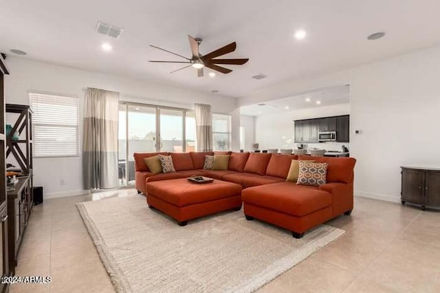 living room with ceiling fan