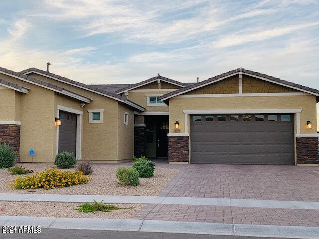 view of front of property featuring a garage