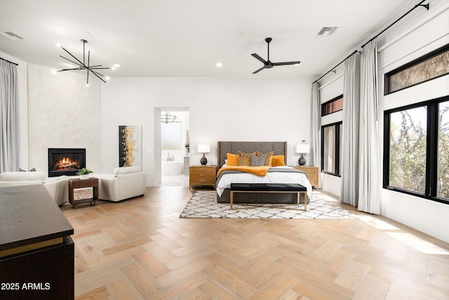 30600 N Pima Rd Unit 89, Scottsdale, AZ 85266 - bedroom with visible vents, recessed lighting, a notable chandelier, and a fireplace