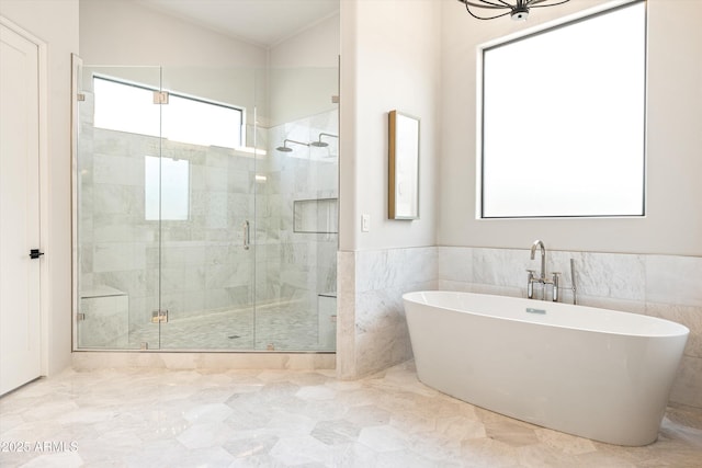 30600 N Pima Rd Unit 89, Scottsdale, AZ 85266 - bathroom featuring a soaking tub, a shower stall, wainscoting, marble finish floor, and lofted ceiling