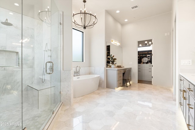 30600 N Pima Rd Unit 89, Scottsdale, AZ 85266 - full bathroom with vanity, visible vents, an inviting chandelier, and a stall shower