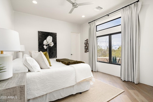 30600 N Pima Rd Unit 89, Scottsdale, AZ 85266 - bedroom with light wood finished floors, a ceiling fan, visible vents, and recessed lighting