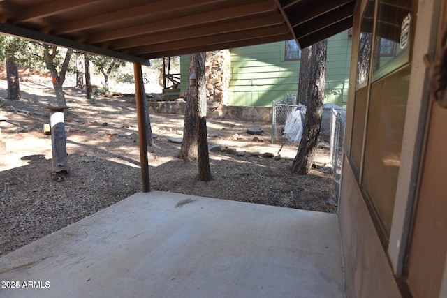 view of patio with fence