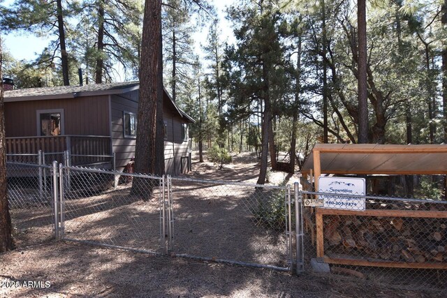 view of yard featuring a gate