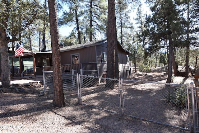 exterior space with a gate and fence