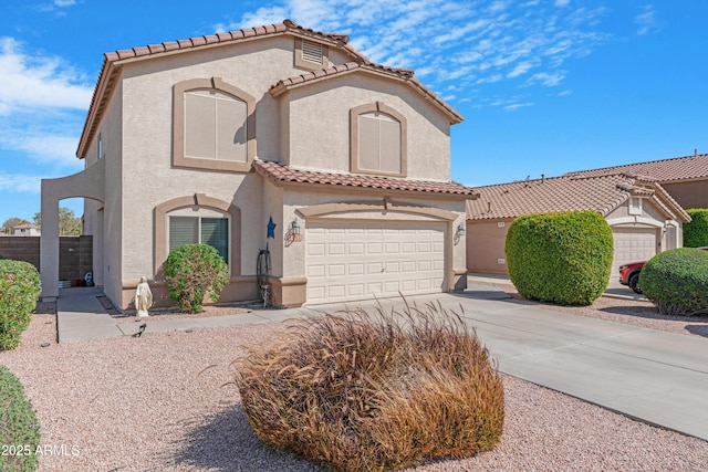 view of front of home with fence, driveway, an attached garage, stucco siding, and a tile roof