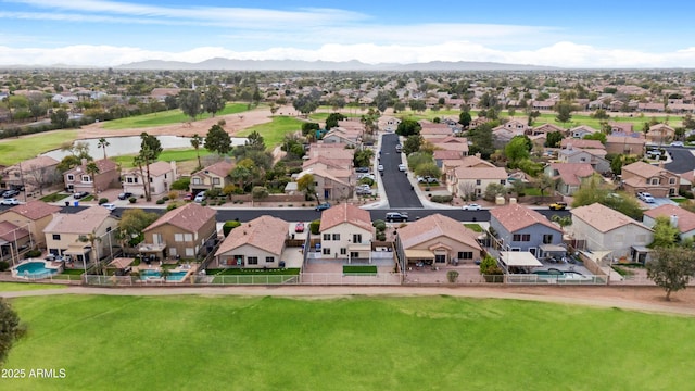 bird's eye view featuring a mountain view and a residential view