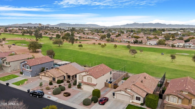 birds eye view of property with a mountain view and a residential view