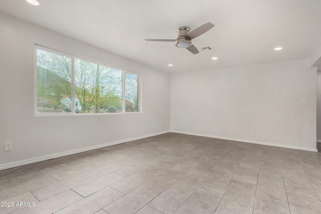 empty room with recessed lighting, visible vents, baseboards, and a ceiling fan