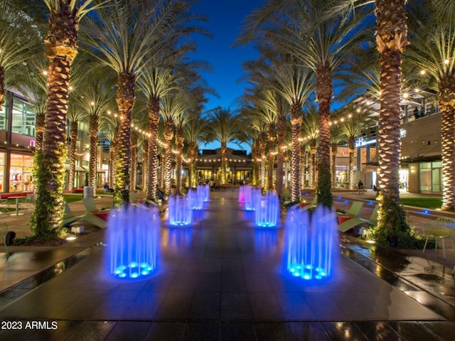 view of pool at night
