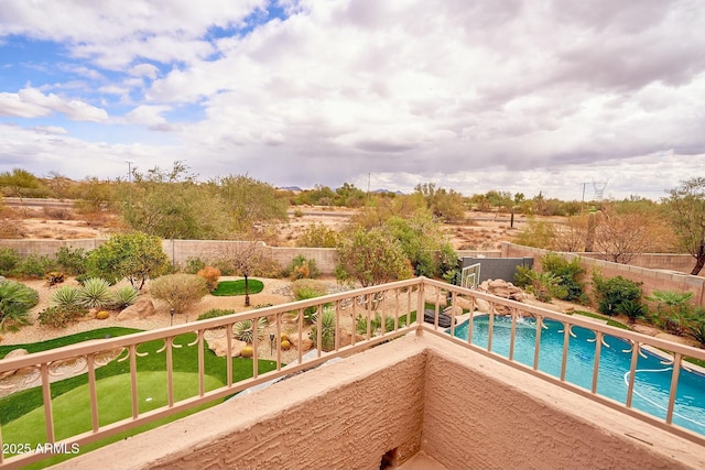 view of swimming pool featuring a fenced in pool and a fenced backyard