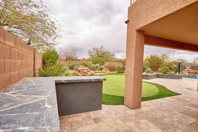 view of patio with a fenced backyard