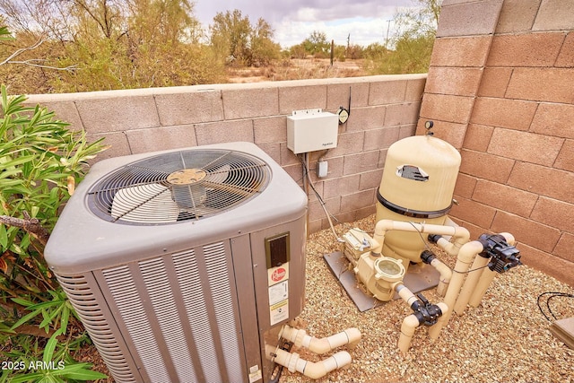 exterior details featuring central AC unit