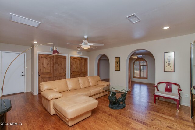 office space featuring ceiling fan and light hardwood / wood-style flooring