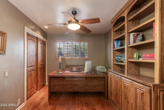 view of patio / terrace with a fenced in pool and ceiling fan