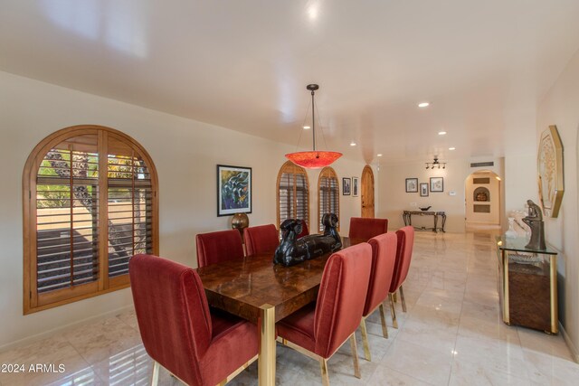 living room with expansive windows, light tile patterned flooring, and a large fireplace