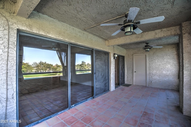 view of patio / terrace featuring ceiling fan