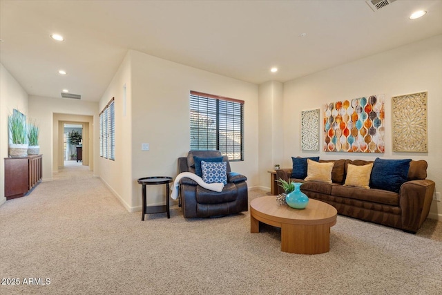 living room with light colored carpet