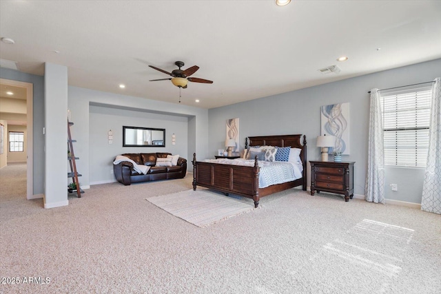 carpeted bedroom featuring ceiling fan