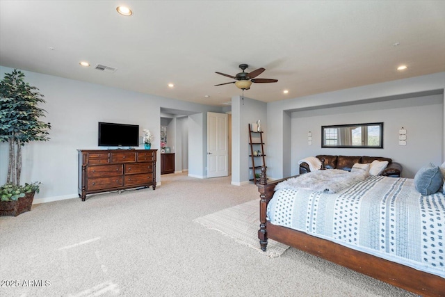 bedroom with ceiling fan and light colored carpet