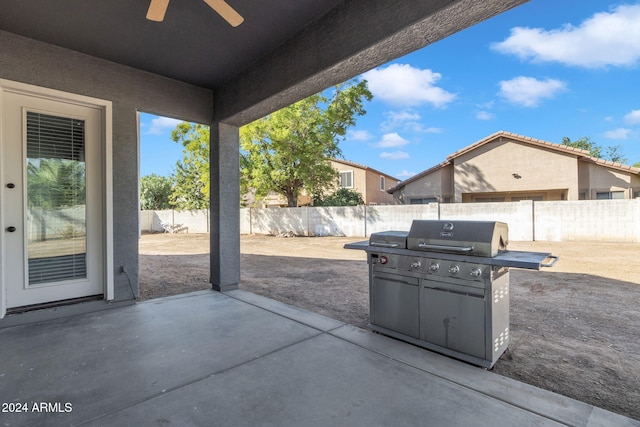 view of patio featuring ceiling fan