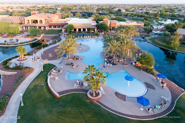 drone / aerial view featuring a water view