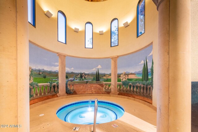 view of pool featuring a hot tub