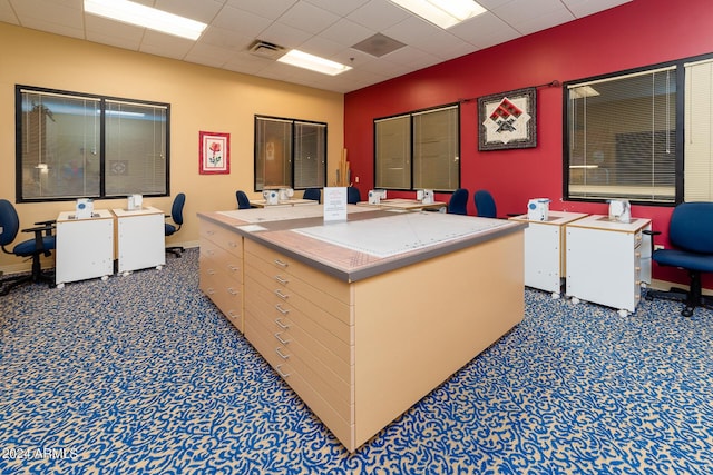 misc room featuring visible vents, carpet flooring, and a paneled ceiling