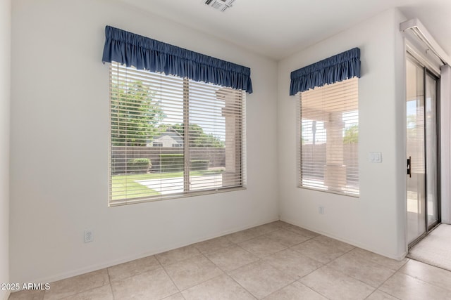 2732 E Tyson St, Chandler, AZ 85225 - unfurnished room featuring baseboards and light tile patterned floors