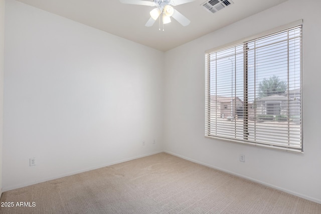 2732 E Tyson St, Chandler, AZ 85225 - empty room with carpet floors, a ceiling fan, and baseboards