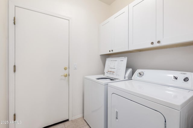 2732 E Tyson St, Chandler, AZ 85225 - laundry area featuring cabinet space, washer and clothes dryer, and light tile patterned floors