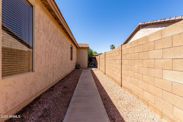 2732 E Tyson St, Chandler, AZ 85225 - view of property exterior featuring fence and stucco siding
