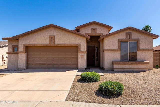 2732 E Tyson St, Chandler, AZ 85225 - mediterranean / spanish-style home featuring an attached garage, concrete driveway, stucco siding, and a tiled roof