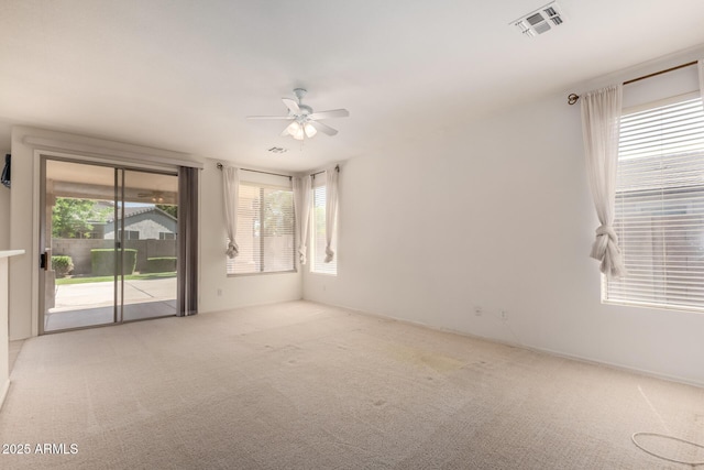 2732 E Tyson St, Chandler, AZ 85225 - empty room featuring a ceiling fan, carpet floors, and plenty of natural light