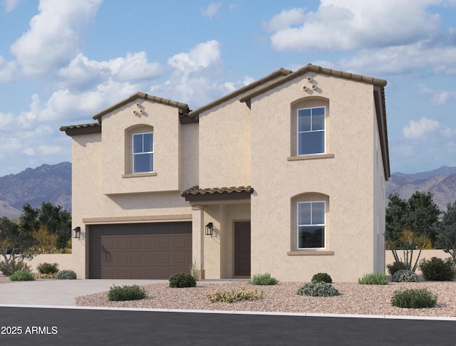 5535 S 240th Ln, Buckeye, AZ 85326 - mediterranean / spanish house featuring a tile roof, a mountain view, a garage, stucco siding, and concrete driveway