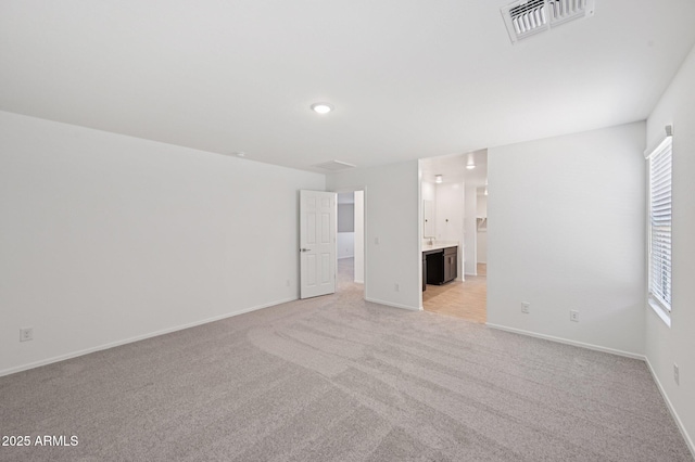 5535 S 240th Ln, Buckeye, AZ 85326 - spare room featuring light carpet and healthy amount of natural light