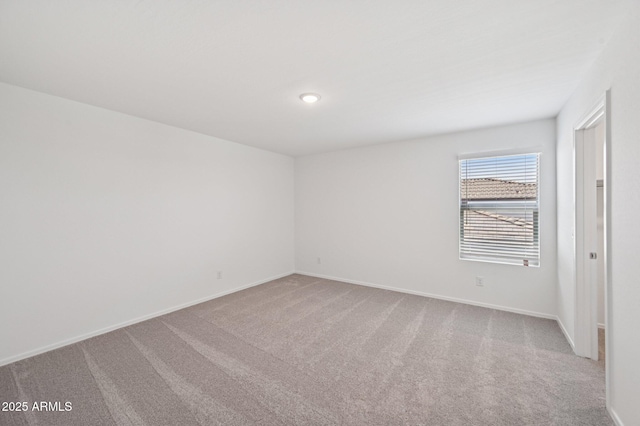 5535 S 240th Ln, Buckeye, AZ 85326 - carpeted empty room featuring baseboards