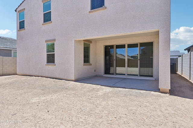 5535 S 240th Ln, Buckeye, AZ 85326 - back of house with a patio area and stucco siding