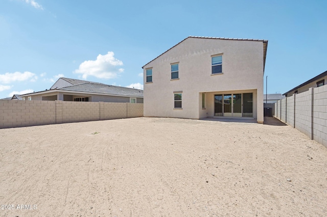 5535 S 240th Ln, Buckeye, AZ 85326 - rear view of property with a fenced backyard, stucco siding, and a patio area