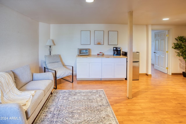 living area featuring light hardwood / wood-style floors