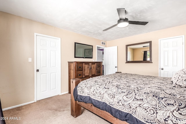 bedroom featuring carpet and ceiling fan