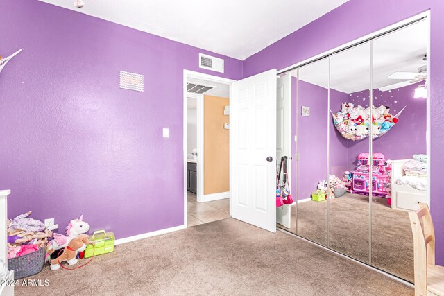 game room with ceiling fan and carpet floors