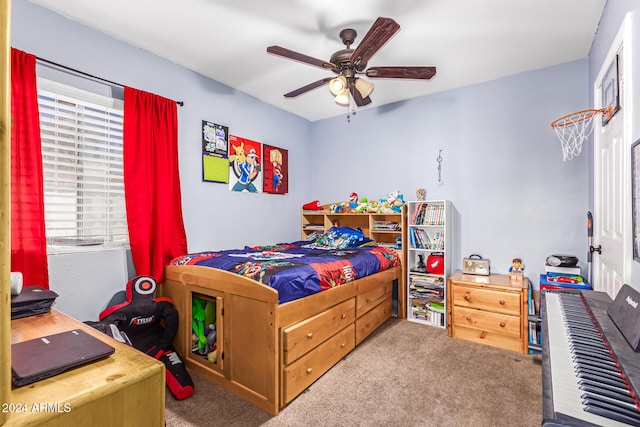 bedroom featuring ceiling fan and carpet floors