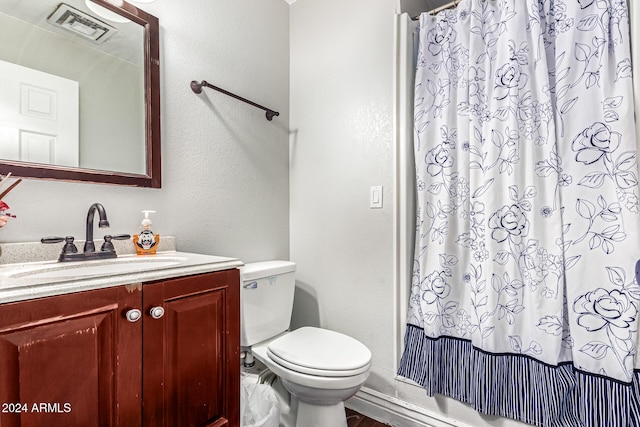 bathroom with vanity, toilet, and a shower with shower curtain